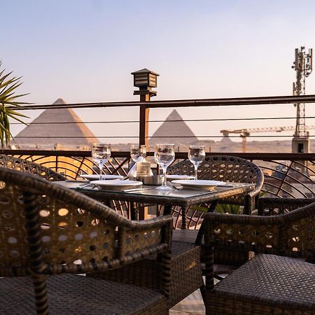 ホテル Pyramids Gem Plaza Kafret el-Gabal エクステリア 写真